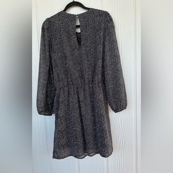 76CAROLINA BELLE Elegant Puffed Sleeve Polka-dot Black & White Mini Dress
SizeМ - Picture 3 of 16